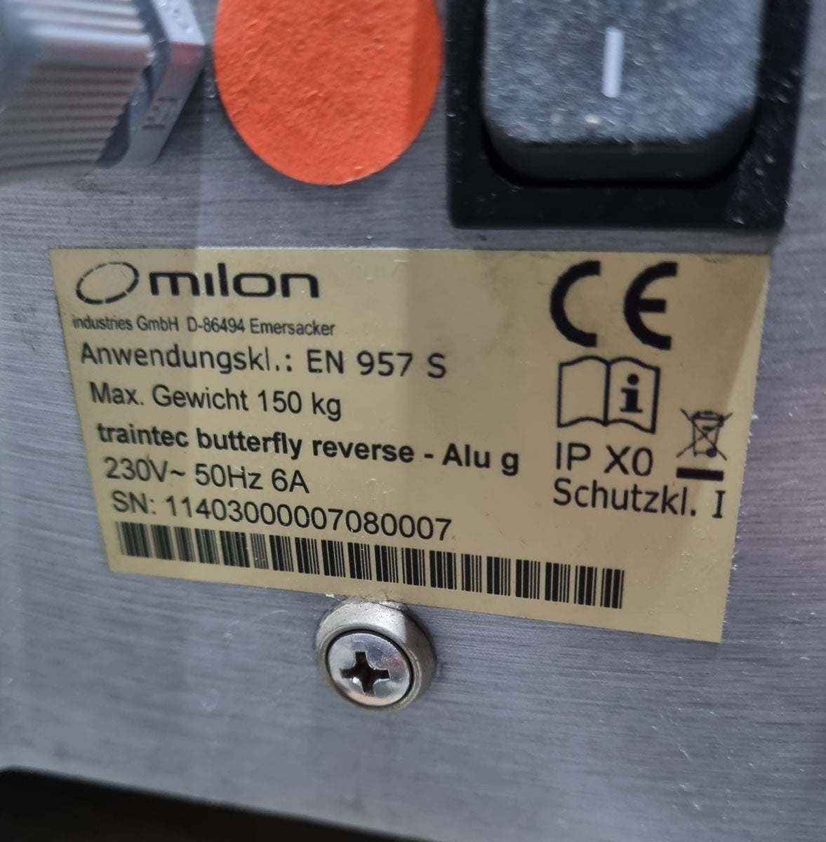 Milon Butterfly Reverse, Einzelgerät, Aluminium Verkleidung, Polsterfarbe Orange, gebraucht - überholter Zustand