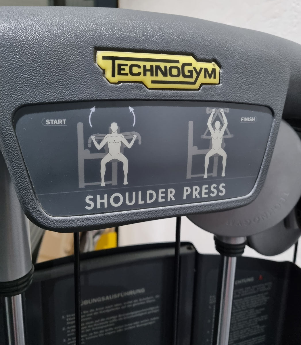 TechnoGym Schulterpresse, Shoulder Press, Selection Line - Rahmen Silber, Polster Braun, gebraucht - überholter Zustand