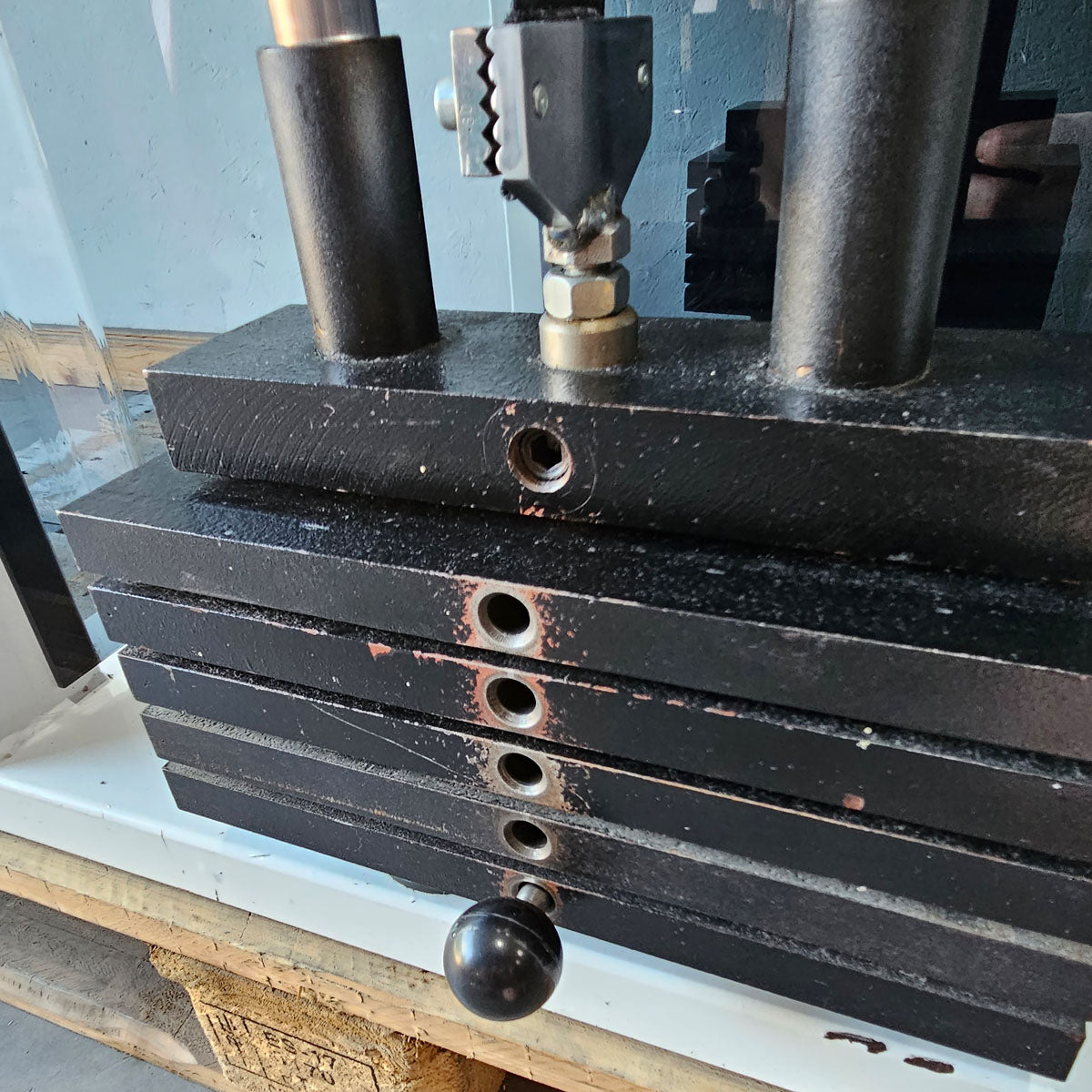 Bruns buttock machine, standing glute machine, glute isolator raise, old school bodybuilding strength machine, white frame, used with signs of wear