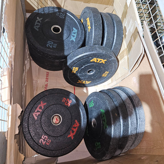 Set 230kg Bumper Plates von ATX - 2x 25kg, 4x 20kg, 4x 15kg, 4x 10kg, Hantelscheiben 50mm Durchmesser aus Granulat gepresst in Schwarz mit bunten Farbflecken, gebraucht - mit Gebrauchsspuren