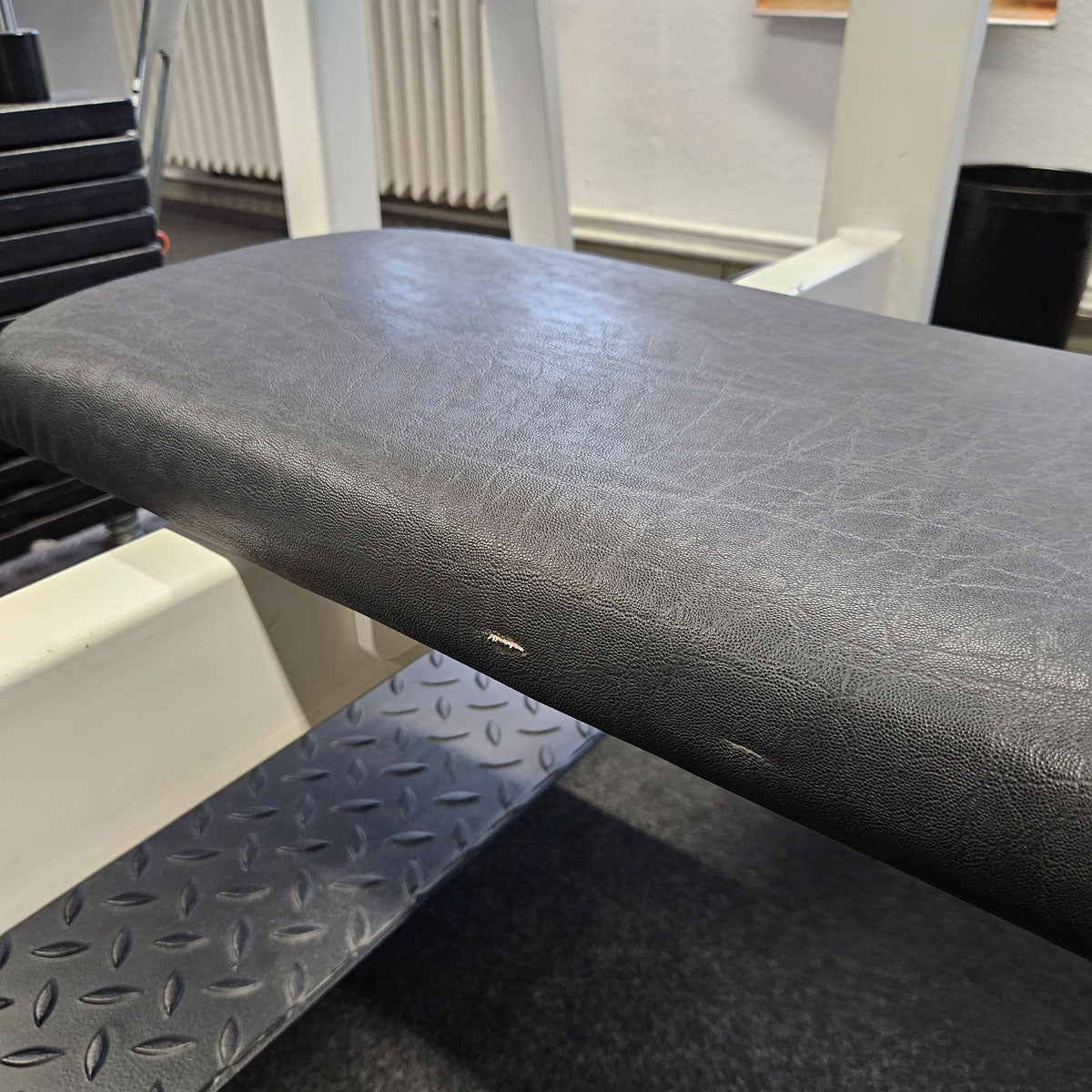 Flat press bench with shelves for bench press, bench press, old school bodybuilding, frame color white, used with signs of wear