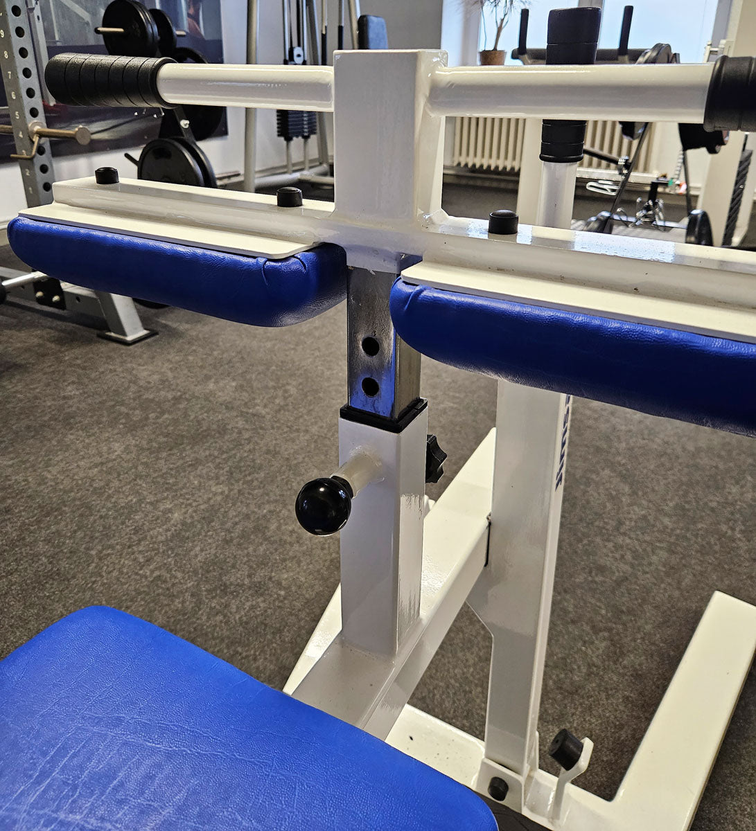 Jimsa calf machine plate loaded 50mm, seated calf raise, frame color white, used and tested with small signs of wear