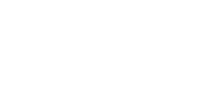 Fitnessgeräte in einem Raum mit sichtbarem Technogym-Logo.