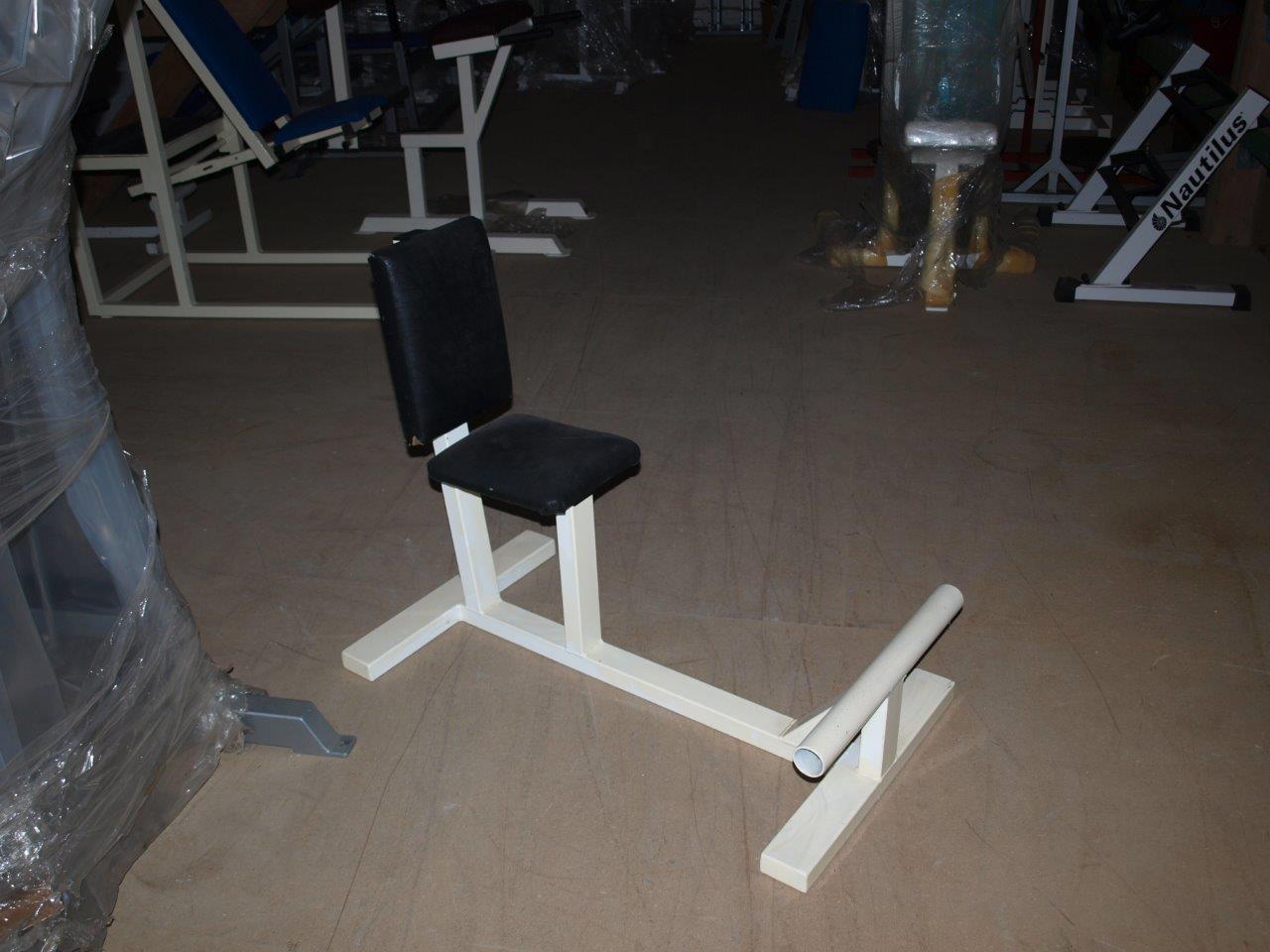 White chair bench with black upholstery, used
