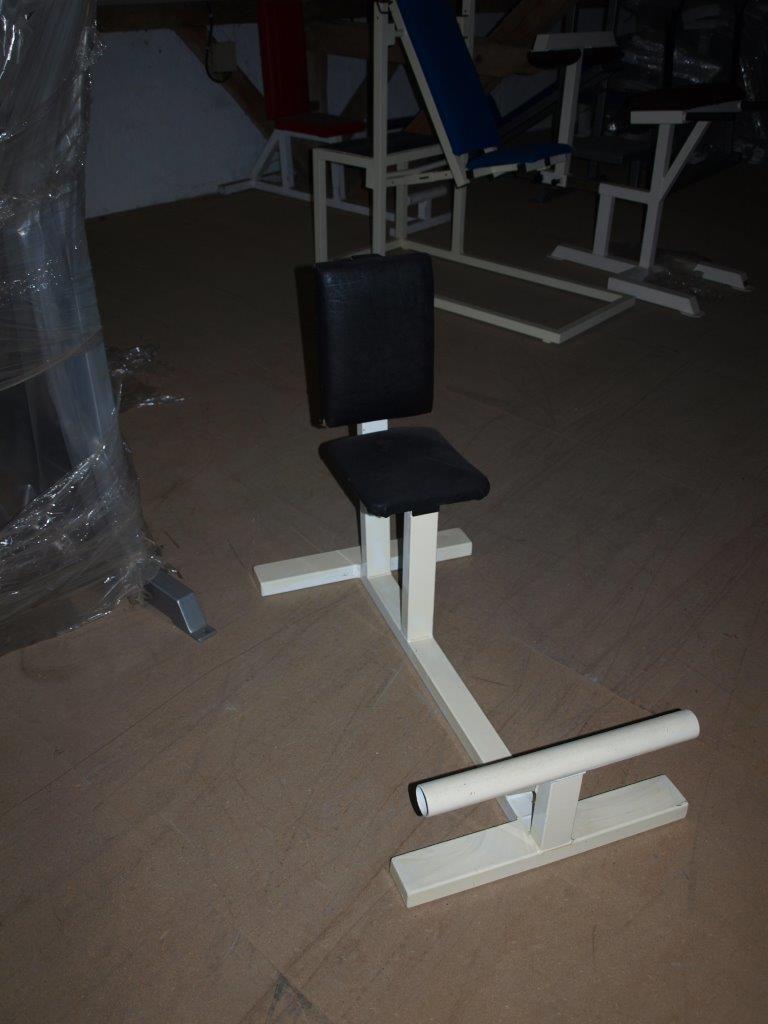 White chair bench with black upholstery, used