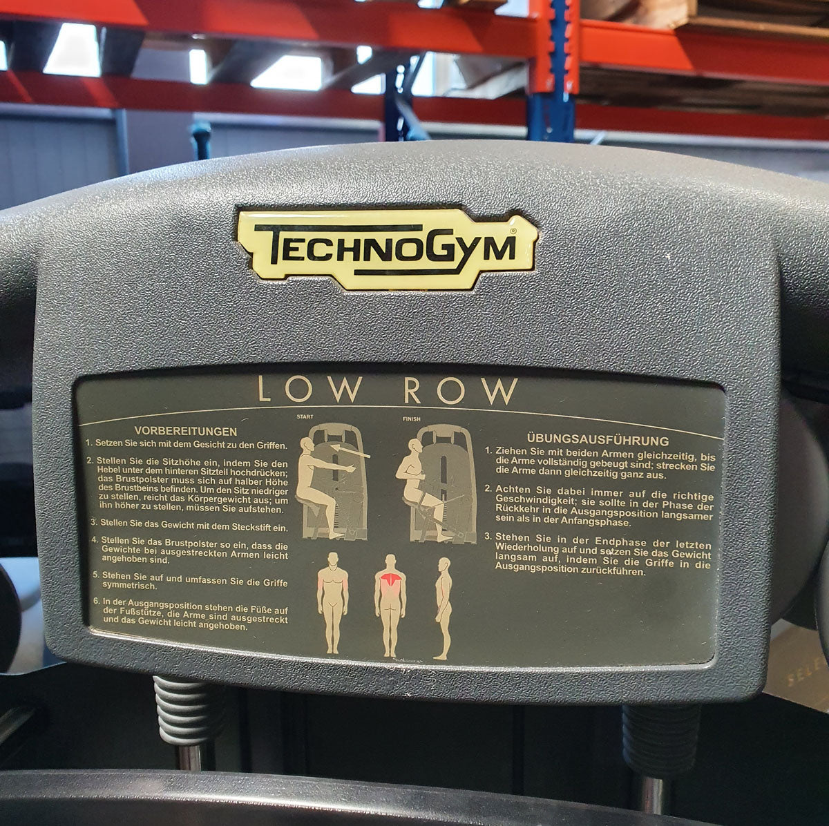 TechnoGym Low Row, Rowing, Lat Isolator, Selection Line - New model with plastic cover, brown upholstery, used - refurbished condition