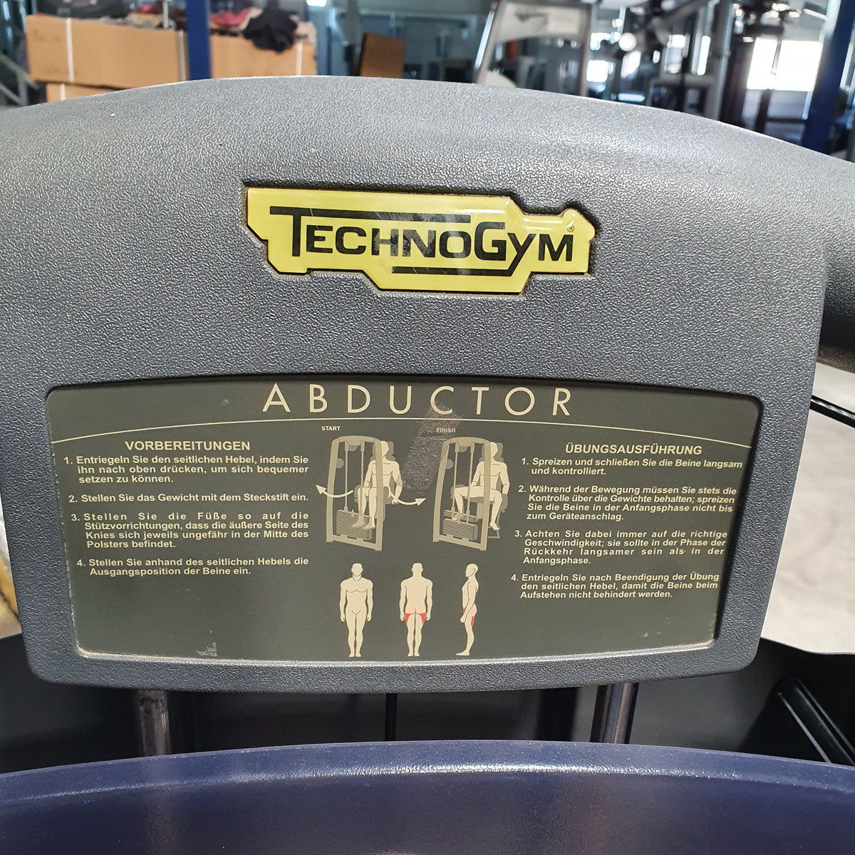 TechnoGym Abductor Machine, Hip Abductor, Selection Line - New model with plastic cover, brown upholstery, used - refurbished condition