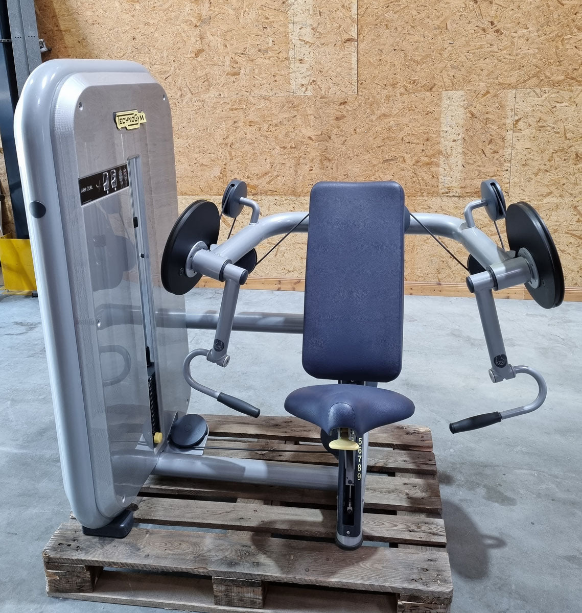 TechnoGym Biceps Machine, Arm Curl, Element Line, frame color silver, upholstery color dove blue, used - refurbished condition