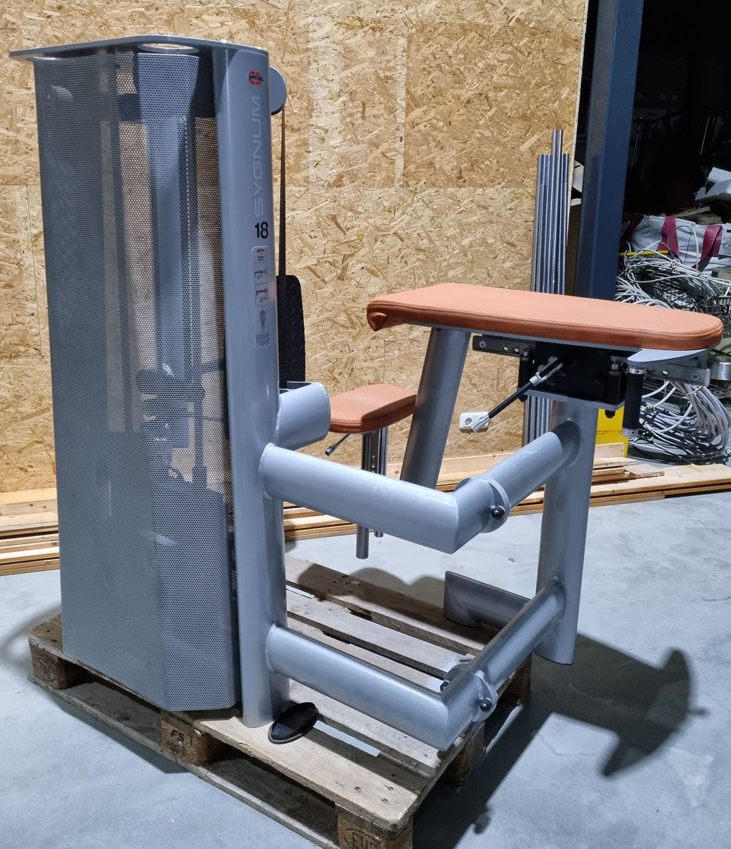 Gym80 Gluteus Kick Kneeling 3004 Sygnum, butt machine, frame color silver, upholstery color orange, used - refurbished condition