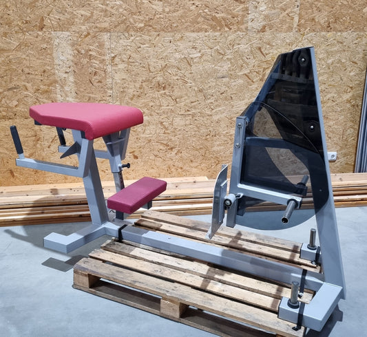 Dr. Wolff Gluteus Radial, Elypso 400 buttock machine, frame color silver, upholstery color red, used - refurbished condition