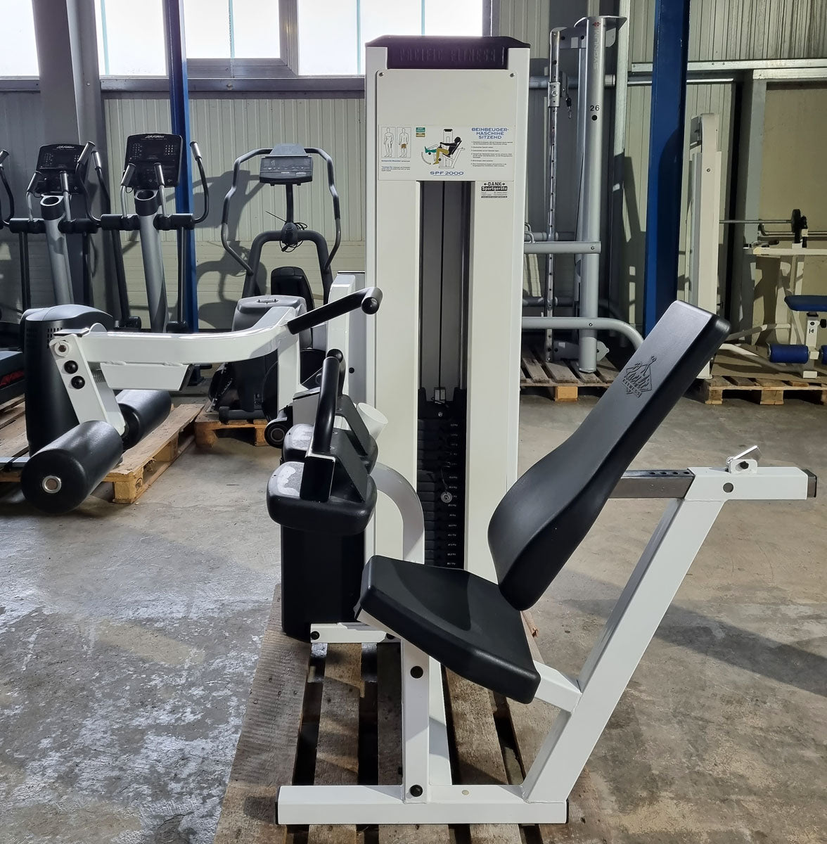 Stairmaster leg curl, seated, white, used, Pacific