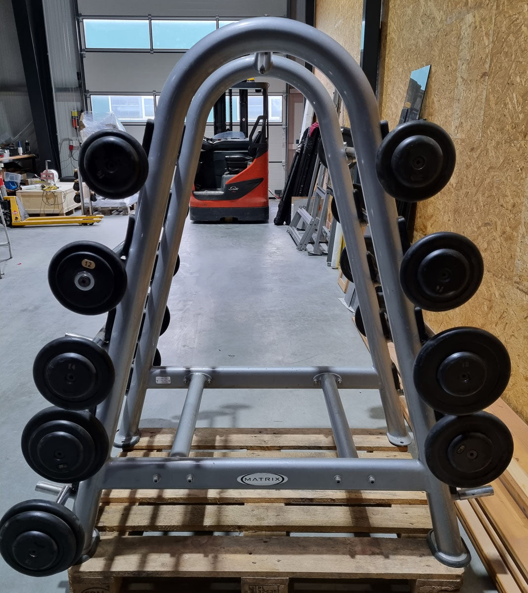 Matrix barbell rack for 10 barbells including 9 compact dumbbells, similar to SZ dumbbells, used condition