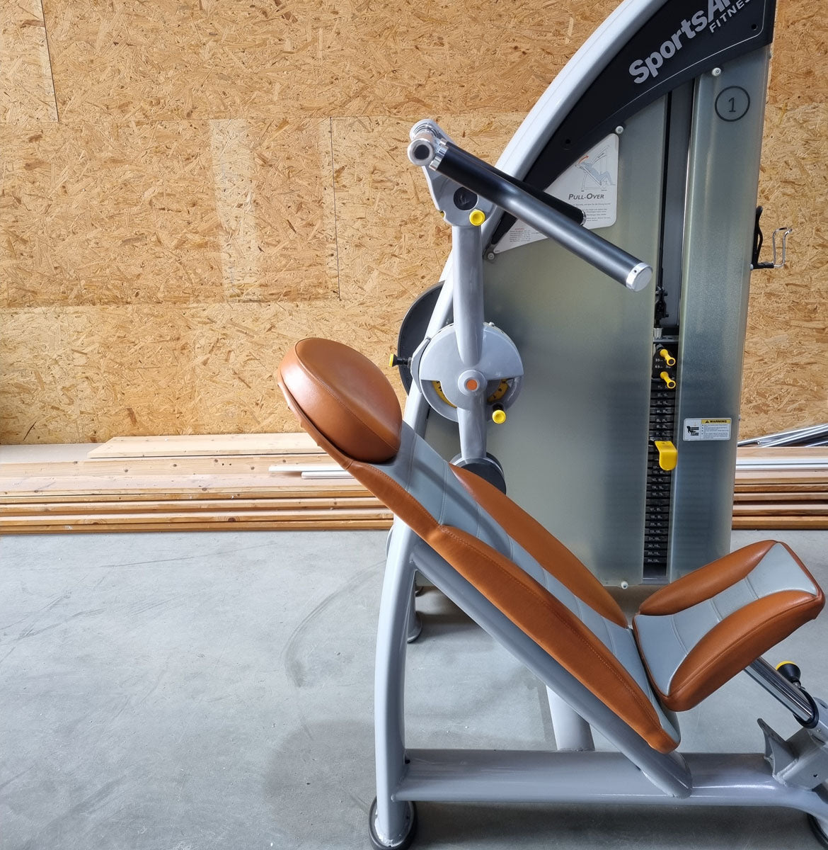 SportsArt Pullover S923 A923 covers, covering machine, frame color silver, upholstery color orange, used - overhauled condition