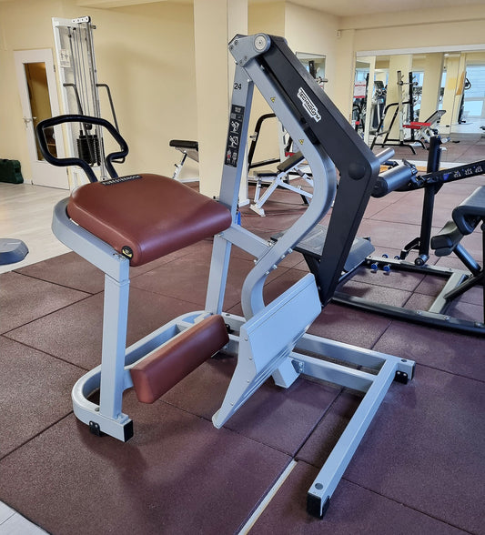 Technogym Pure Rear Kick, gluteus machine, butt machine standing, glute, plate loaded, Pure Strength Series disc holder, frame color silver, used - refurbished condition