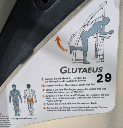 SportsArt Gluteus Maschine S955 A955 N955 Pomaschine stehend, Glutes Kick Radial, Rahmenfarbe Silber, Polsterfarbe Orange/Grau, gebraucht - überholter Zustand