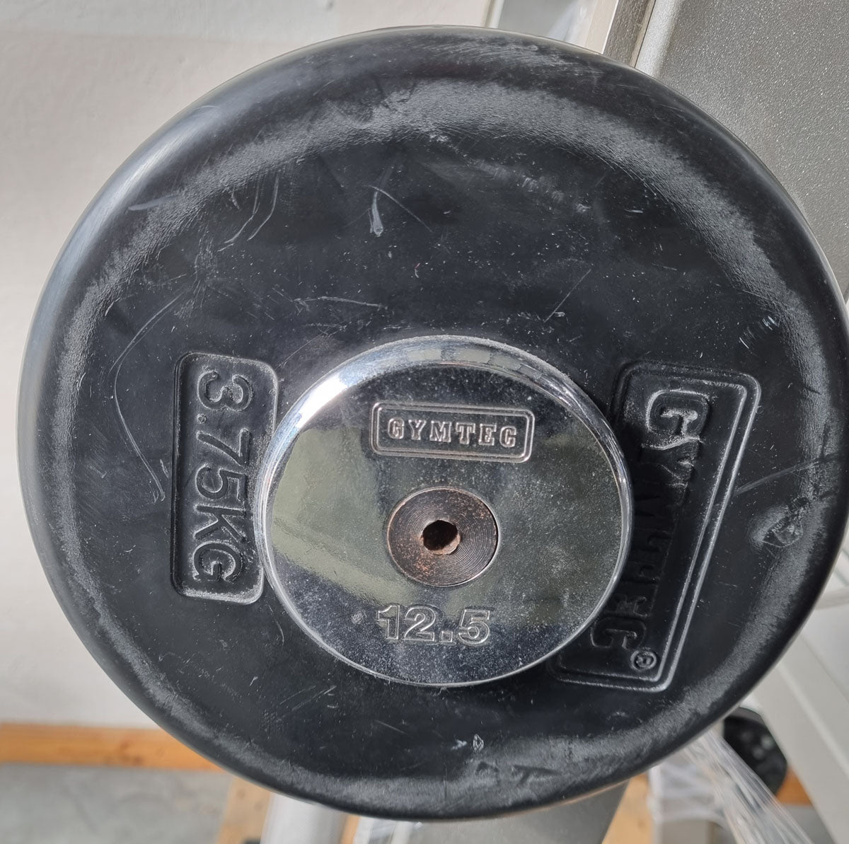 Barbell compact set 12.5 kg to 32.5 kg in 2.5 kg increments, 9 pieces in total, similar to SZ barbells, including stand from Gymleco, stand color silver, used