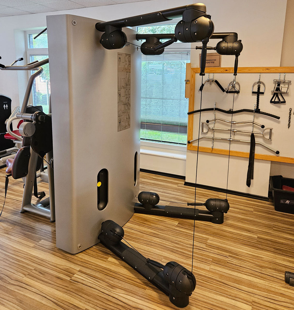 TechnoGym Kinesis One - Multi-station cable pull power station with two weight blocks, used - refurbished condition