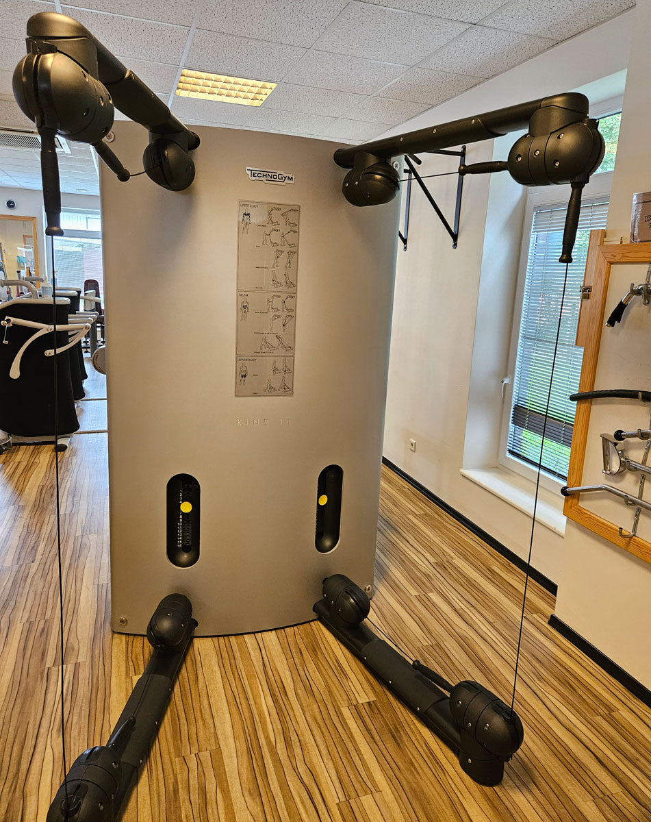TechnoGym Kinesis One - Multi-station cable pull power station with two weight blocks, used - refurbished condition