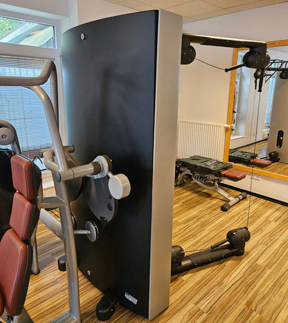TechnoGym Kinesis One - Multi-station cable pull power station with two weight blocks, used - refurbished condition