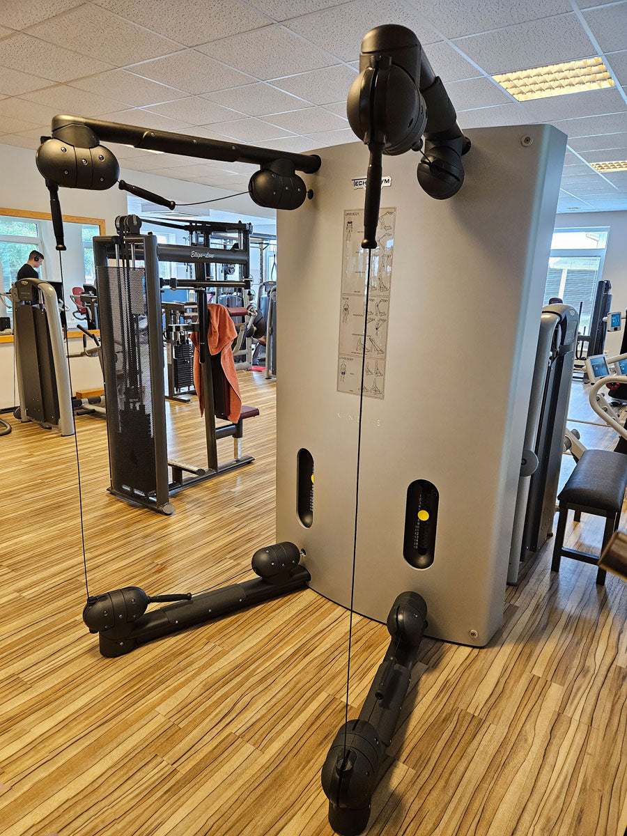 TechnoGym Kinesis One - Multi-station cable pull power station with two weight blocks, used - refurbished condition