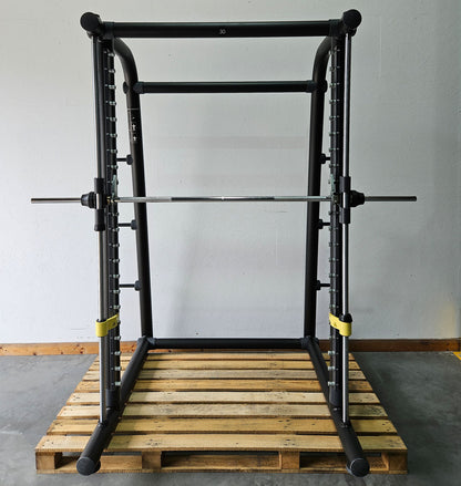 Technogym Multipower Multipresse geführt, Smith Machine, Scheibenaufnahme, Rahmenfarbe Schwarz, gebraucht - überholter Zustand