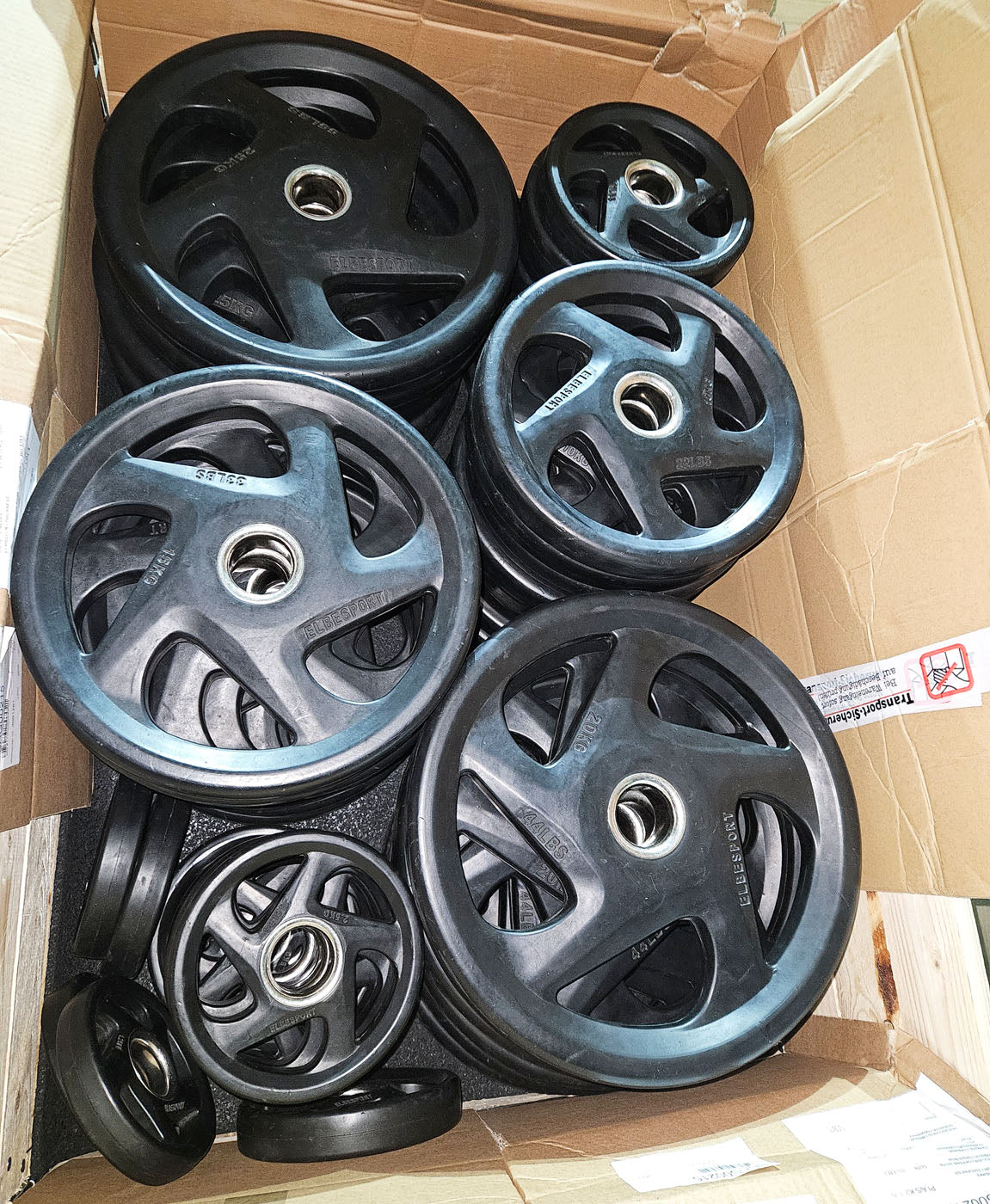 Elbesport Olympia weight plates V5, rubber, 1722 kg total, 138 rubberized grippers, color black, used - relatively good condition - visual signs of wear