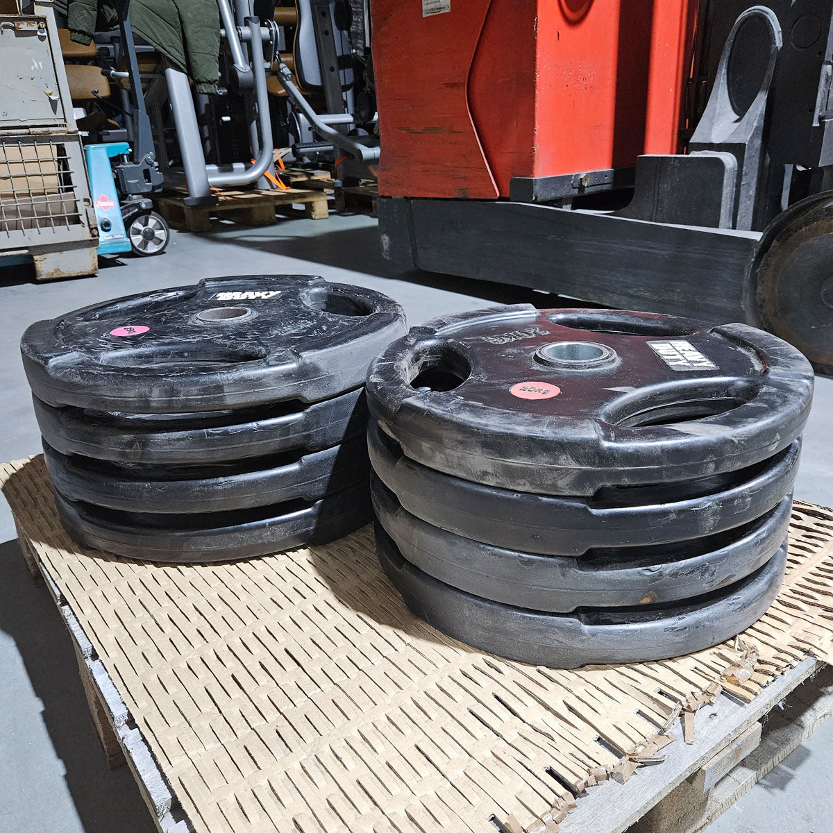 Set 180kg Hantelscheiben aus Gummi, 4x 25kg und 4x 20kg Scheiben mit 50mm Durchmesser, gebraucht - mit Gebrauchsspuren