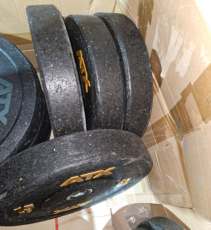 Set 230kg Bumper Plates von ATX - 2x 25kg, 4x 20kg, 4x 15kg, 4x 10kg, Hantelscheiben 50mm Durchmesser aus Granulat gepresst in Schwarz mit bunten Farbflecken, gebraucht - mit Gebrauchsspuren