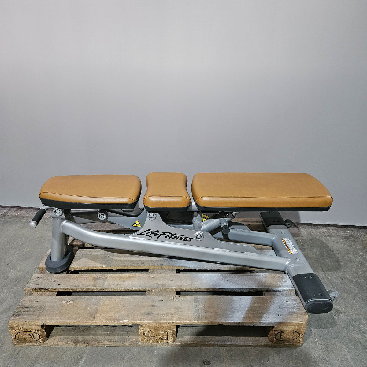 Life Fitness Multi-Adjustable Bench SMAB, Signature Series, frame color silver, upholstery color orange, used - refurbished condition