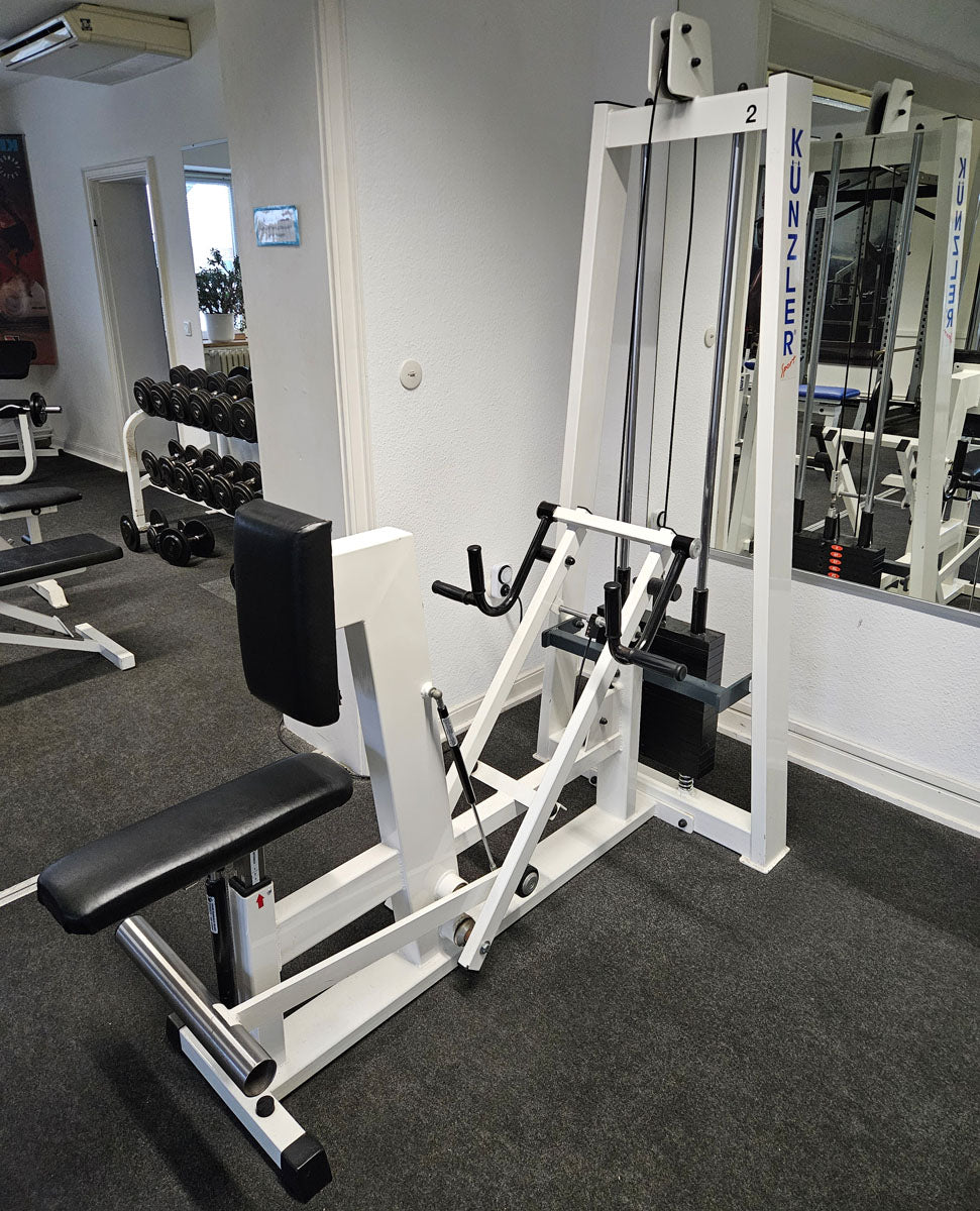 Künzler rowing machine with chest support and entry aid, row, lat rowing, old school bodybuilding strength machine, frame color white, used and tested with signs of wear