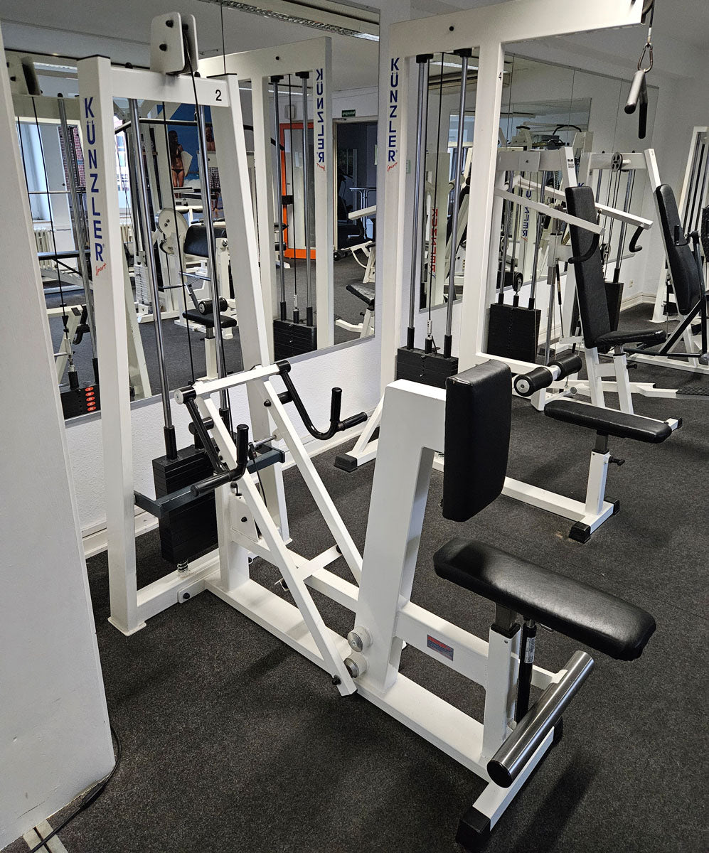 Künzler rowing machine with chest support and entry aid, row, lat rowing, old school bodybuilding strength machine, frame color white, used and tested with signs of wear