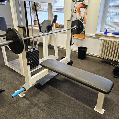 Flat press bench with shelves for bench press, bench press, old school bodybuilding, frame color white, used with signs of wear