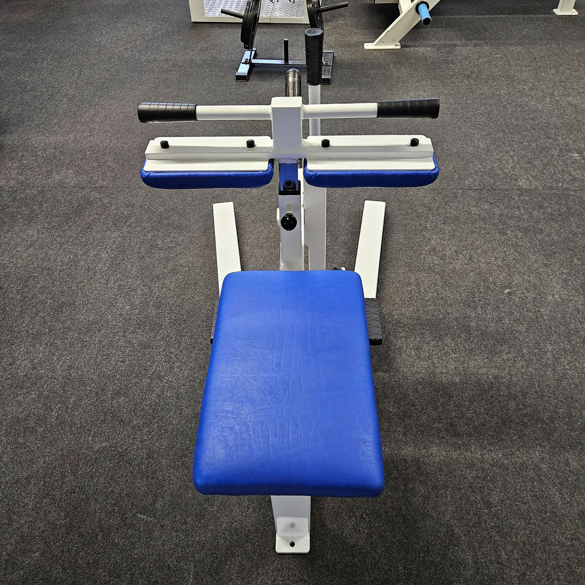 Jimsa calf machine plate loaded 50mm, seated calf raise, frame color white, used and tested with small signs of wear