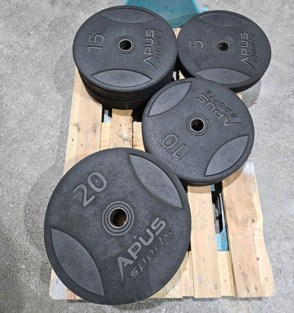 Set 100kg Bumper Plates von Apus Sports - 2x 20kg, 2x 15kg, 2x 10kg und 2x 5kg, Hantelscheiben 50mm Durchmesser aus Granulat gepresst in Schwarz, gebraucht - mit Gebrauchsspuren
