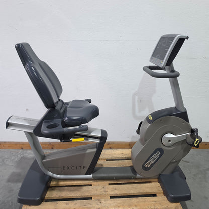 TechnoGym Recumbent Excite Line Recline 700, LED Display, standard pedal arms, with hand pulse, dark blue upholstery, used - refurbished condition