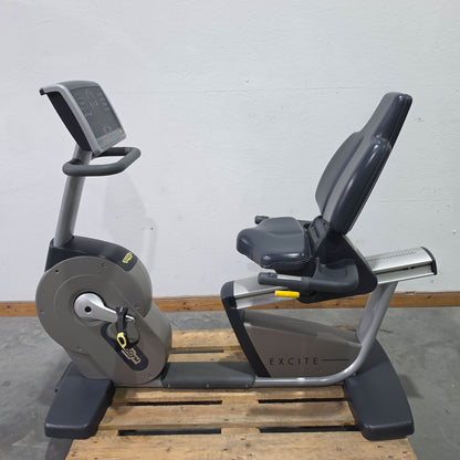 TechnoGym Recumbent Excite Line Recline 700, LED Display, standard pedal arms, with hand pulse, dark blue upholstery, used - refurbished condition