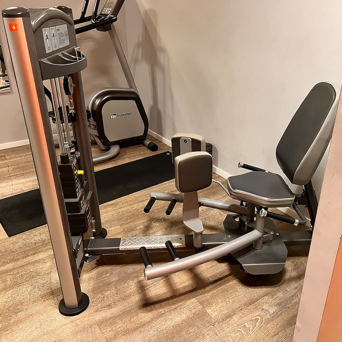 Impulse Fitness Abductors and Adductors 2 in 1 Combination Machine - Hip Abduction and Hip Adduction, frame color gray-anthracite, used - refurbished condition