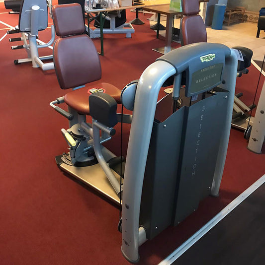 TechnoGym Abductor Machine, Hip Abductor, Selection Line - New model with plastic cover, brown upholstery, used - refurbished condition