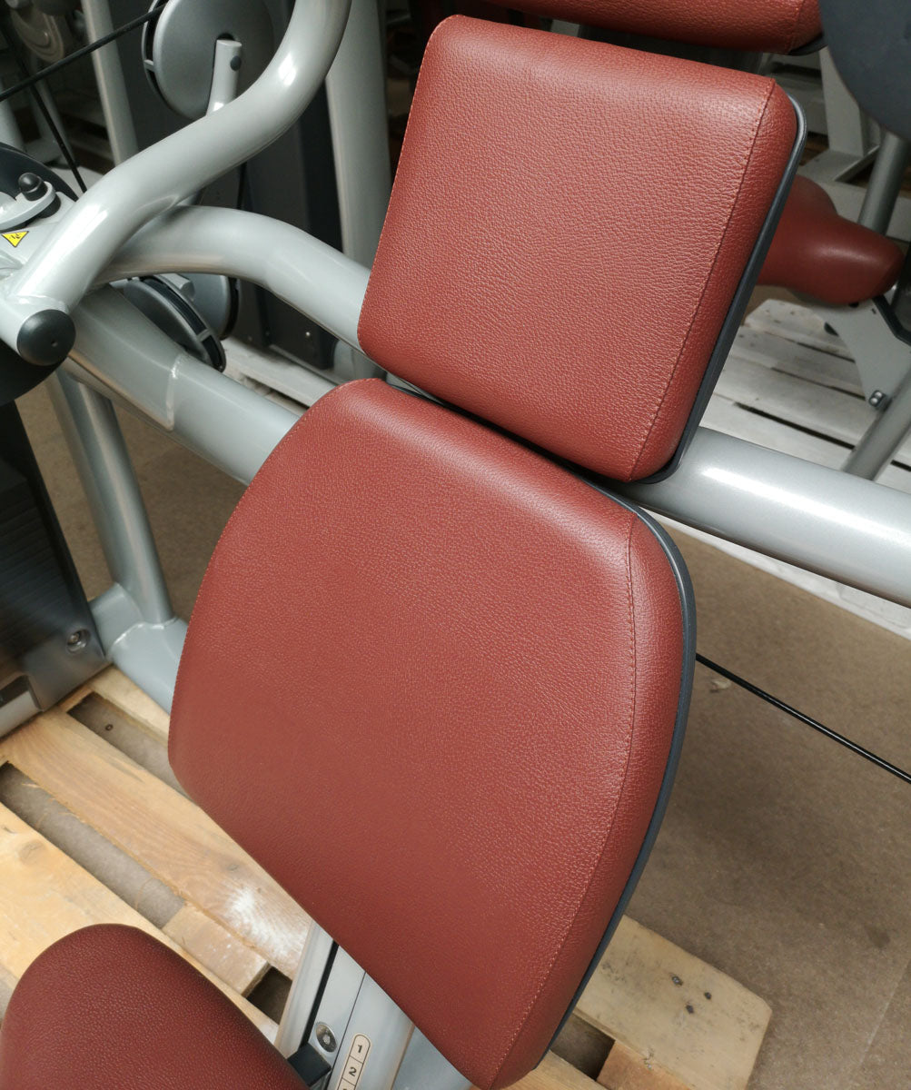 TechnoGym Triceps Machine, Arm Extension, Selection Line - New model with plastic cover, brown upholstery, used - refurbished condition