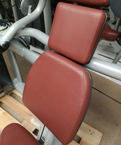 TechnoGym Triceps Machine, Arm Extension, Selection Line - New model with plastic cover, brown upholstery, used - refurbished condition