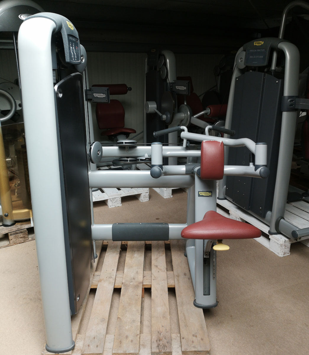 TechnoGym Upper Back, Rowing Row, Lat Isolator, Selection Line - New model with plastic cover, brown upholstery, used - refurbished condition