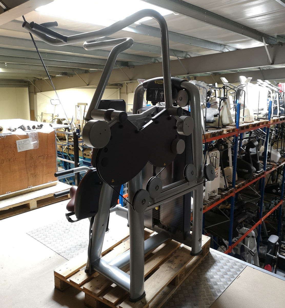 TechnoGym Lat Pulldown, Vertical Traction, Pulldown, Selection Line - New model with plastic cover, brown upholstery, used - refurbished condition