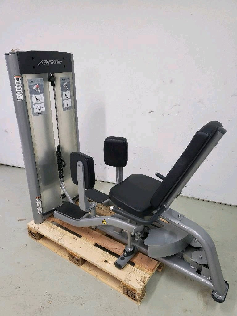 Life Fitness Optima Series - 12 strength training machines in a set, 14 training stations, color silver, used - refurbished condition
