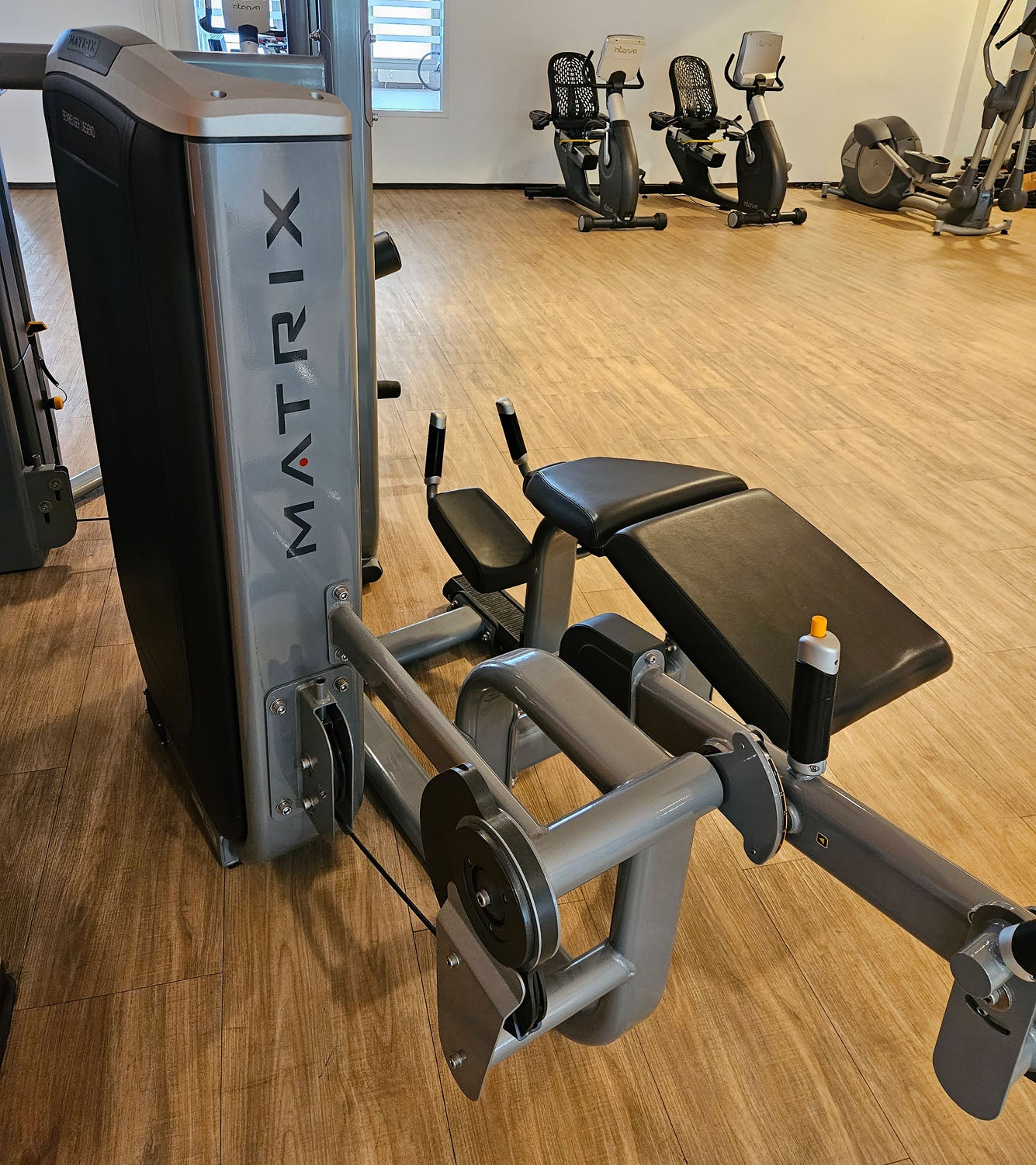 Matrix Ultra Prone Leg Curl G7-S73, recumbent leg curl machine, silver frame, used - refurbished condition