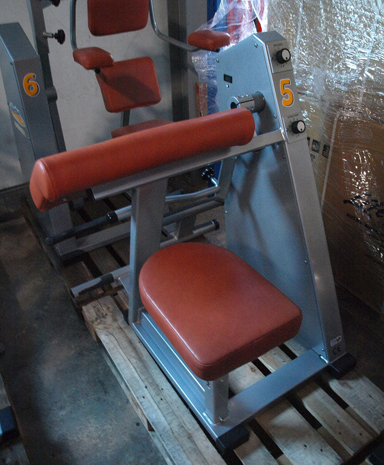 Effective Strength Endurance Circuit - 9 strength machines, silver frame, orange upholstery, used