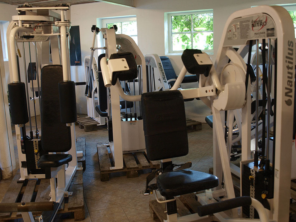 Nautilus Nitro Series, strength training equipment, 13 gym machines, white, used