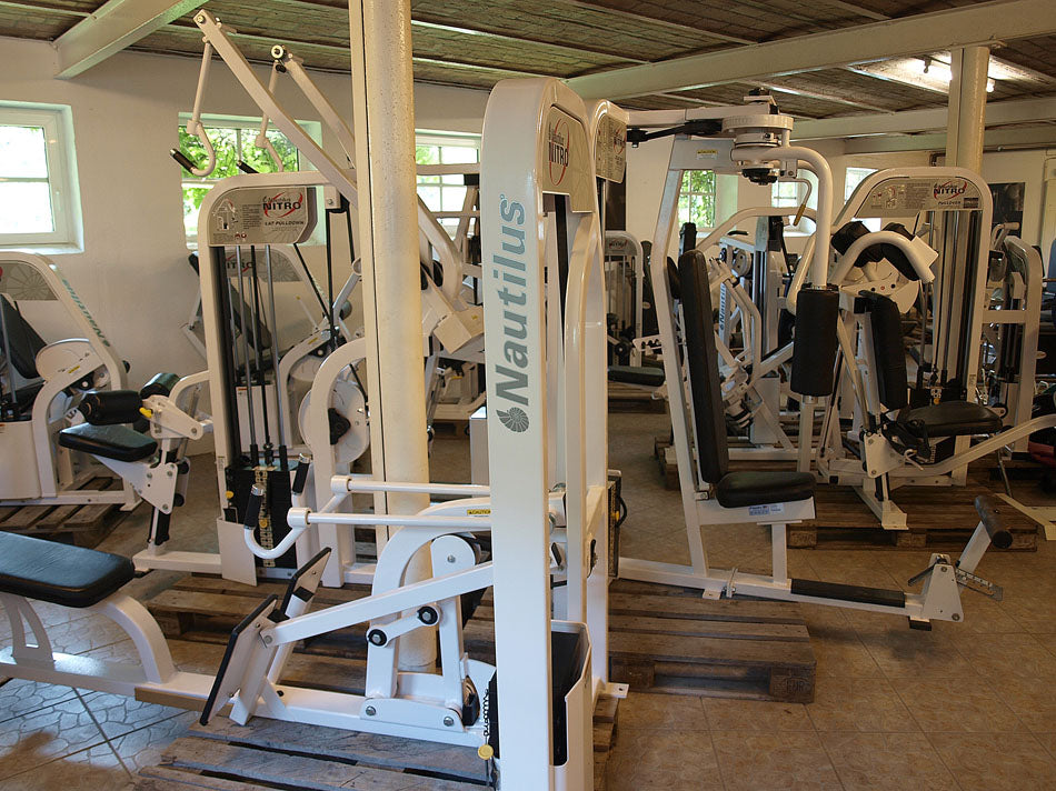 Nautilus Nitro Series, strength training equipment, 13 gym machines, white, used
